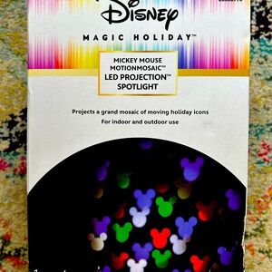 Disney Holiday Magic Color LED Projector. Multicolored Christmas Birthdays